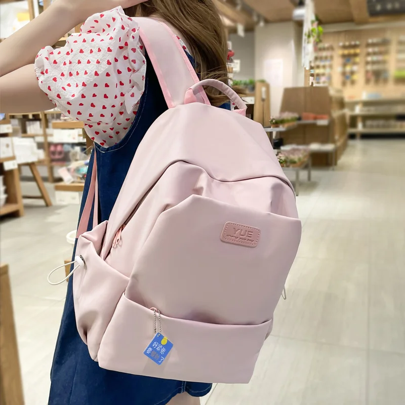 New Waterproof Nylon Women Backpack Female Solid Color Portable Travel Bag Kawaii Girl Big Schoolbag Preppy Badge Bookbag
New Waterproof Nylon Women Backpack Female Solid Color Portable Travel Bag Kawaii Girl Big Schoolbag Preppy Badge Bookbag
