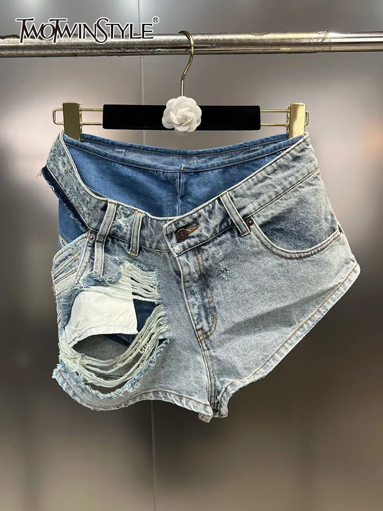 TWOTWINSTYLE Minimalist Denim Shorts For Women High Waist Patchwork Button Casual Loose Hollow Out Short Pants Female Fashion
TWOTWINSTYLE Minimalist Denim Shorts For Women High Waist Patchwork Button Casual Loose Hollow Out Short Pants Female Fashion