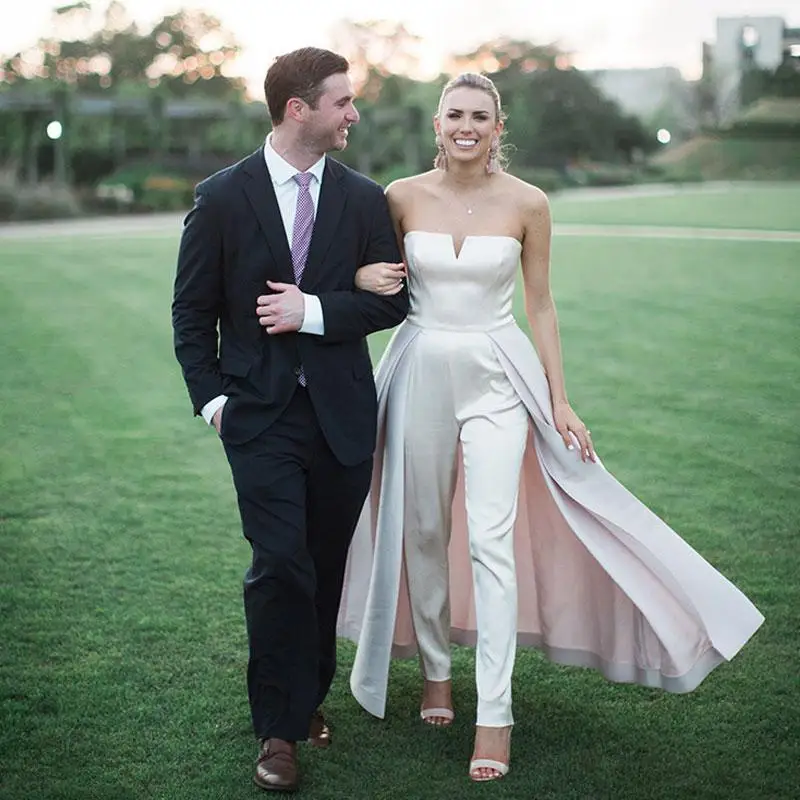 Sexy Satin A Line Wedding Gowns With Overskirt Strapless Jumpsuits Bridal Dresses With Pants Sweep Train For Women
Sexy Satin A Line Wedding Gowns With Overskirt Strapless Jumpsuits Bridal Dresses With Pants Sweep Train For Women