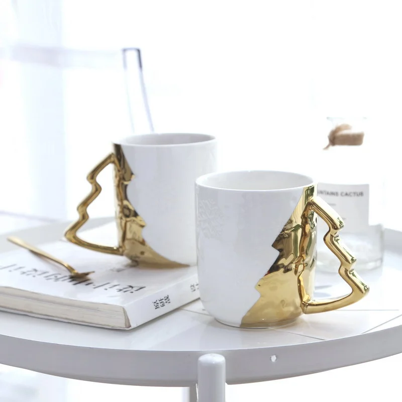 Nordic Luxury Christmas Simple Tumbler Water Glass Cup Gold-plated Tree Cups Coffee Mug White Ceramic Milk Mugs Shot Glasses
Nordic Luxury Christmas Simple Tumbler Water Glass Cup Gold-plated Tree Cups Coffee Mug White Ceramic Milk Mugs Shot Glasses