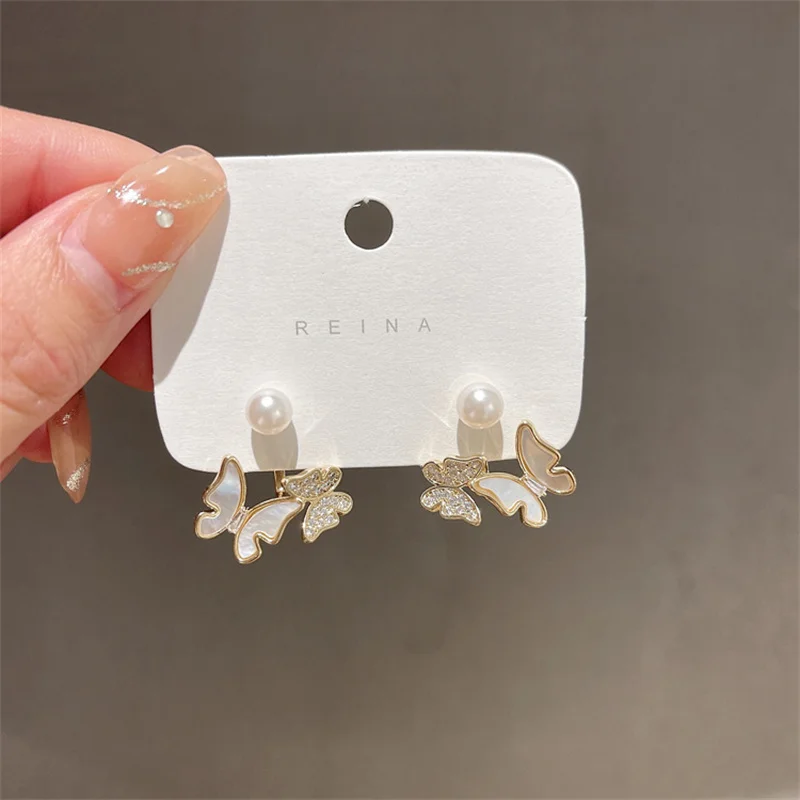 Korean Elegant Flower Butterfly Zircon Pearl Stud Earrings for Women Minimalist Luxury Crystal Wedding Earring Fashion Jewelry
Korean Elegant Flower Butterfly Zircon Pearl Stud Earrings for Women Minimalist Luxury Crystal Wedding Earring Fashion Jewelry