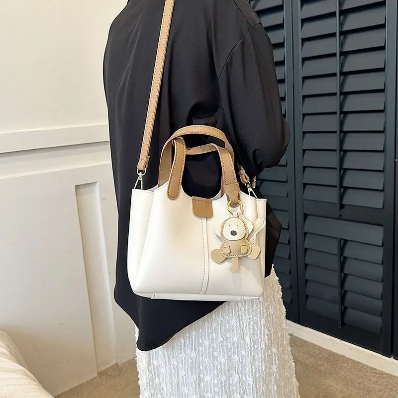Miracle Kira 2023 Autumn/Winter New Fashion Simple Large Capacity Portable Bucket Bag One Shoulder Crossbody Bags Holiday Gift
Miracle Kira 2023 Autumn/Winter New Fashion Simple Large Capacity Portable Bucket Bag One Shoulder Crossbody Bags Holiday Gift