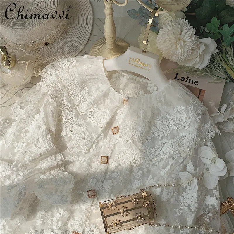 French Elegant Embroidered Pearl Ruffles Peter Pan Collar Blouse 2022 Autumn New Fashion Loose Bell Sleeve Lace Shirt Womens Top
French Elegant Embroidered Pearl Ruffles Peter Pan Collar Blouse 2022 Autumn New Fashion Loose Bell Sleeve Lace Shirt Womens Top