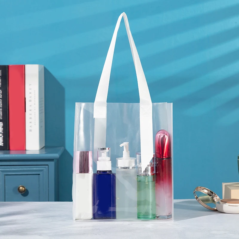 Новая модная сумка для покупок из ПВХ прозрачная матовая пластиковая многоразовая сумка для магазина одежды Подарочная сумка для хранения ... 
Новая модная сумка для покупок из ПВХ прозрачная матовая пластиковая многоразовая сумка для магазина одежды Подарочная сумка для хранения ...