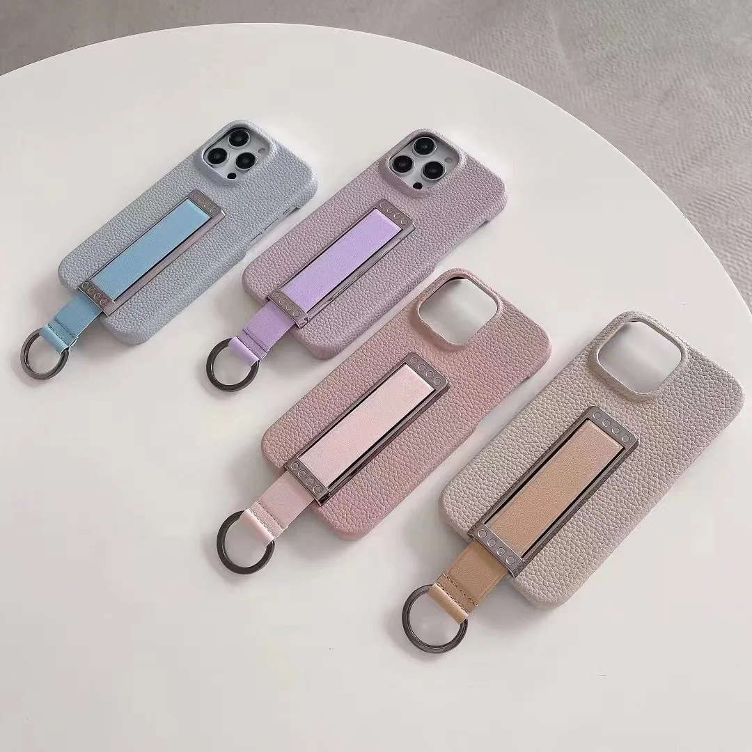 Fashion Business Wrist Bracket Leather Phone Case for iPhone 14 13 12 11 Pro Max 11 12 13 14 Pro 14 13 12 11
Fashion Business Wrist Bracket Leather Phone Case for iPhone 14 13 12 11 Pro Max 11 12 13 14 Pro 14 13 12 11