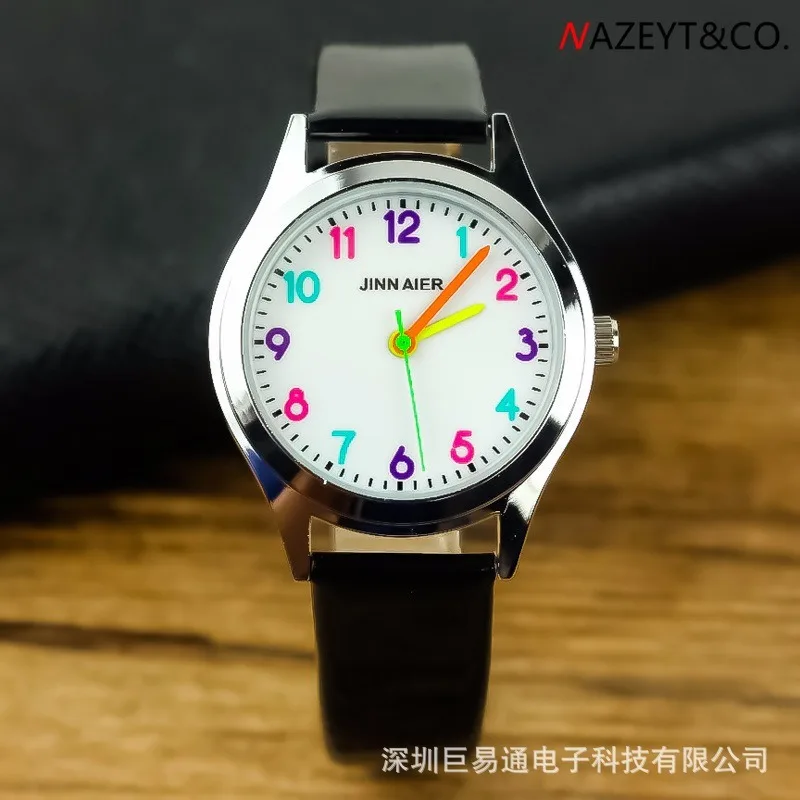 The new belt color needle colored digital contracted children watch early know time quartz watch
The new belt color needle colored digital contracted children watch early know time quartz watch