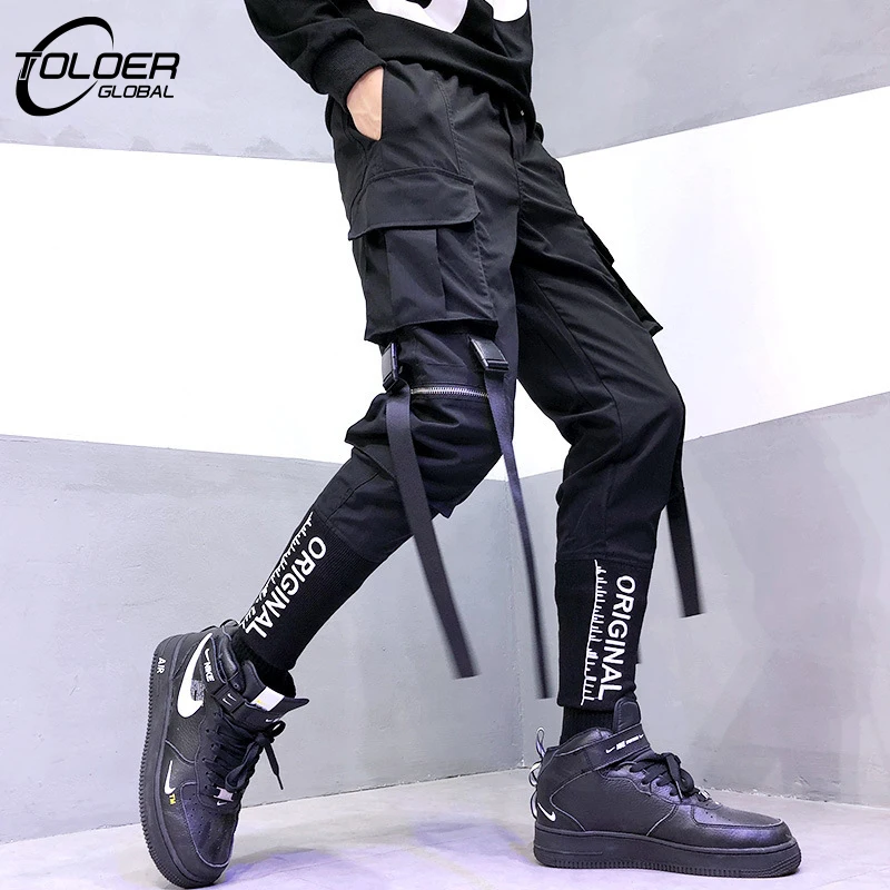 2022 Hip Hop Joggers Men Letter Ribbons Cargo Pants Casual Harem Trousers Summer Harajuku Pants Male Sweatpants Sport Streetwear
2022 Hip Hop Joggers Men Letter Ribbons Cargo Pants Casual Harem Trousers Summer Harajuku Pants Male Sweatpants Sport Streetwear