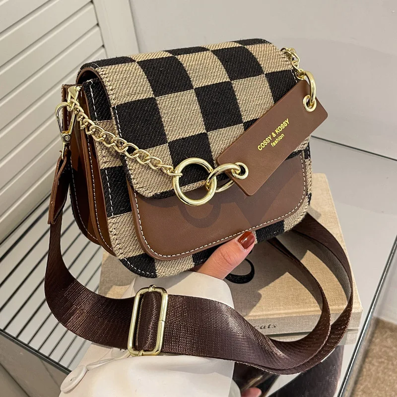 Casual Leather Shoulder Bag Women's Bag 2021 Winter New Fashion Checkerboard Messenger Bag Niche Texture Small Square Bag
Casual Leather Shoulder Bag Women's Bag 2021 Winter New Fashion Checkerboard Messenger Bag Niche Texture Small Square Bag