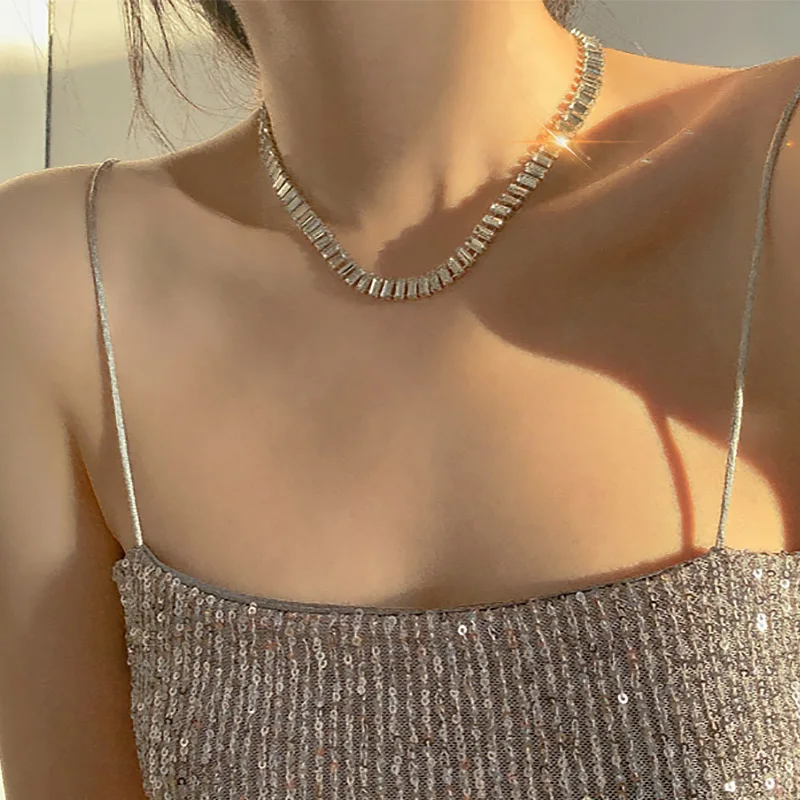 Sexy Tennis Choker Necklace for Women Luxury Dazzling Crystal Iced Out Zirconia Collar Short Chain on Neck Party Fashion Jewelry
Sexy Tennis Choker Necklace for Women Luxury Dazzling Crystal Iced Out Zirconia Collar Short Chain on Neck Party Fashion Jewelry