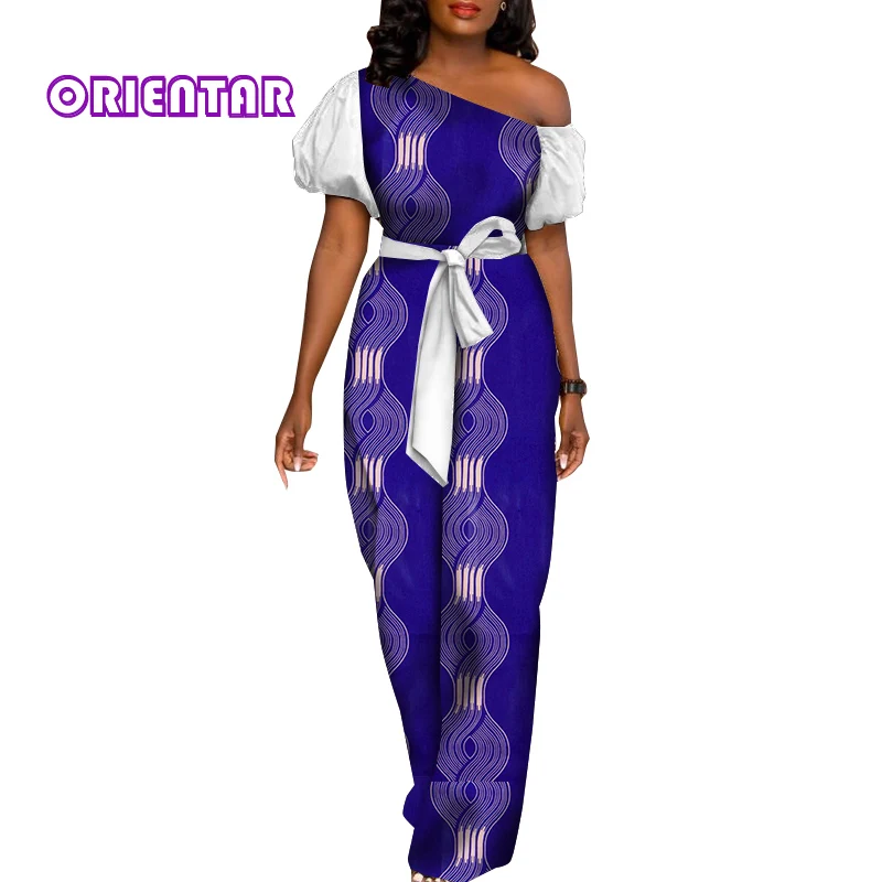 Женские летние комбинезоны в африканском стиле, элегантный комбинезон с принтом Анкары и коротким рукавом, комбинезон с косым воротником, уличная одежда, длинный комбинезон WY8866, 2022
Женские летние комбинезоны в африканском стиле, элегантный комбинезон с принтом Анкары и коротким рукавом, комбинезон с косым воротником, уличная одежда, длинный комбинезон WY8866, 2022