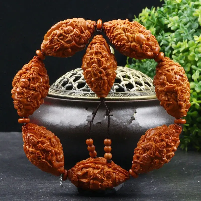 Olive core hand string explosion, pure hand carved Buddha hand string decoration products and gifts
Olive core hand string explosion, pure hand carved Buddha hand string decoration products and gifts