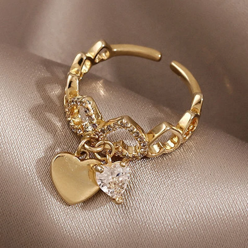 Cute Design Sweet Zircon Heart Pendant Gold Color Open Rings Korean Fashion Jewelry Wedding Girl's Luxury Accessories for Woman
Cute Design Sweet Zircon Heart Pendant Gold Color Open Rings Korean Fashion Jewelry Wedding Girl's Luxury Accessories for Woman