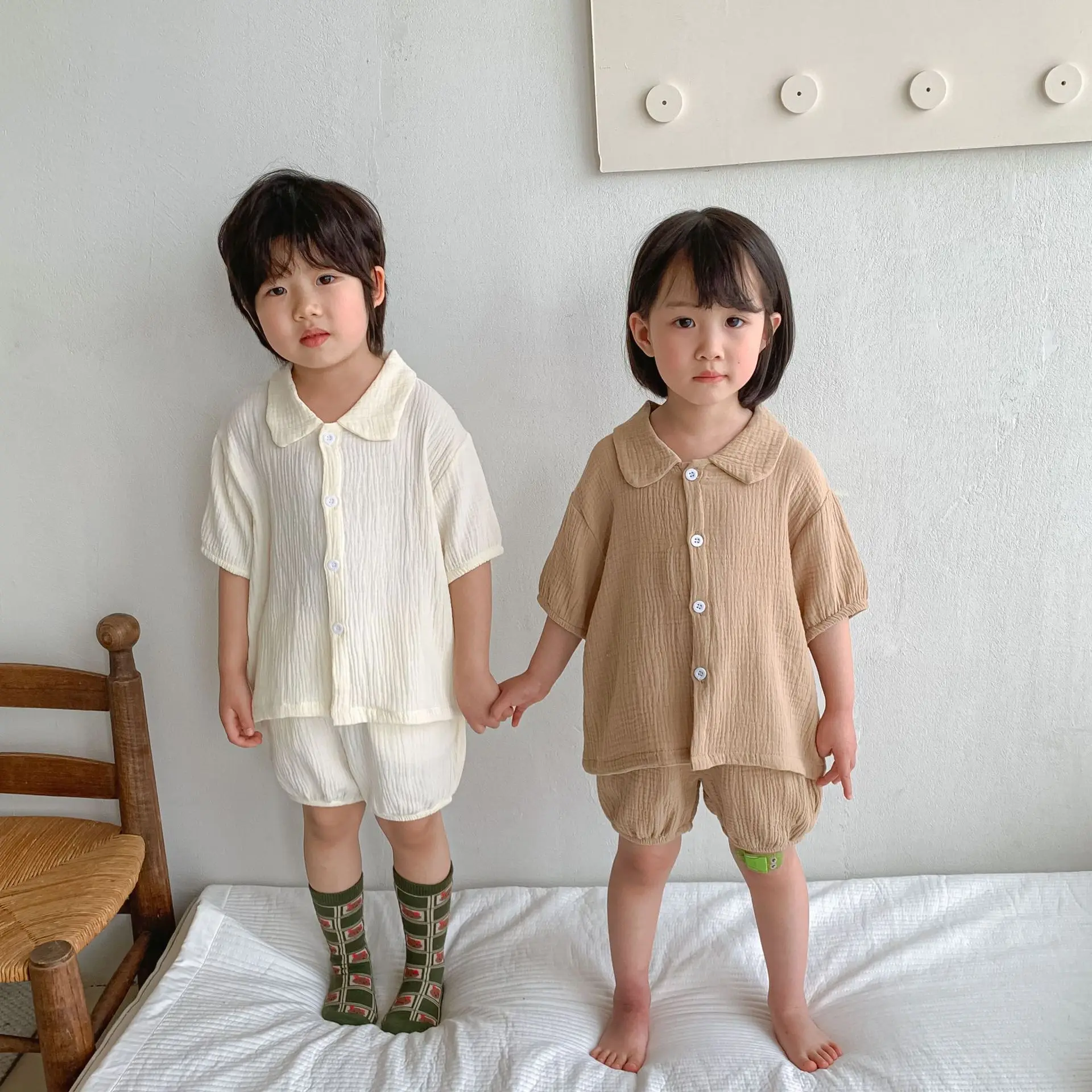 Summer Children Cotton Spun Yarn Cool Clothes Sets Boys and Girls Thin Solid Color Single-breasted Tops and Shorts Leisure Wear
Summer Children Cotton Spun Yarn Cool Clothes Sets Boys and Girls Thin Solid Color Single-breasted Tops and Shorts Leisure Wear