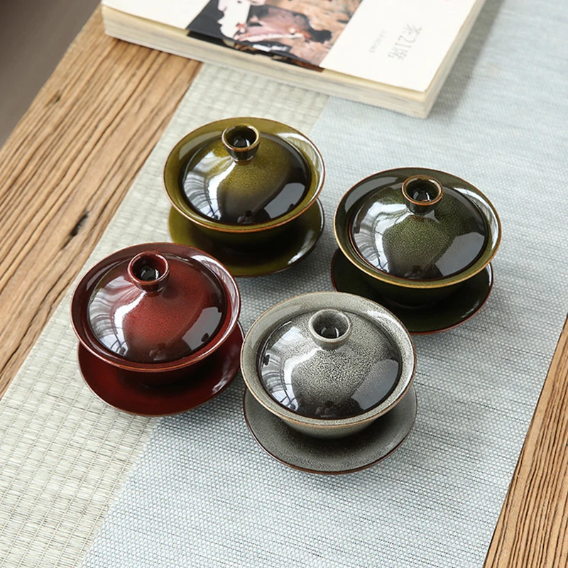 Kiln Change Tianmu Glaze Sancai Cover Bowl Ceramic Tea Set Tea Bowl Tea Cup Covering Bowls of Domestic Kungfu Tea Sets
Kiln Change Tianmu Glaze Sancai Cover Bowl Ceramic Tea Set Tea Bowl Tea Cup Covering Bowls of Domestic Kungfu Tea Sets