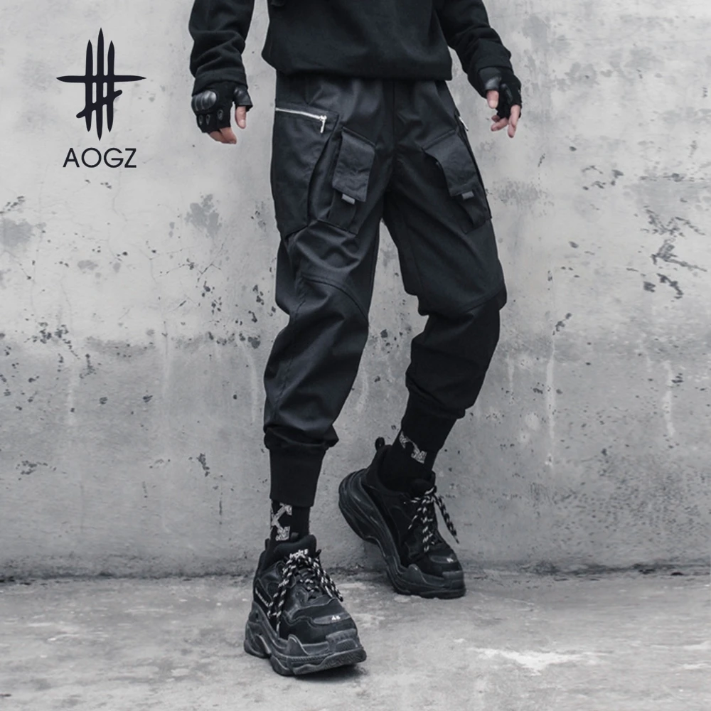 AOGZ Streetwear Harajuku Zipper Pockets Ribbons Techwear Tactical Pants Men Cargo Pants Joggers Casual Loose Trousers Sweatpants
AOGZ Streetwear Harajuku Zipper Pockets Ribbons Techwear Tactical Pants Men Cargo Pants Joggers Casual Loose Trousers Sweatpants