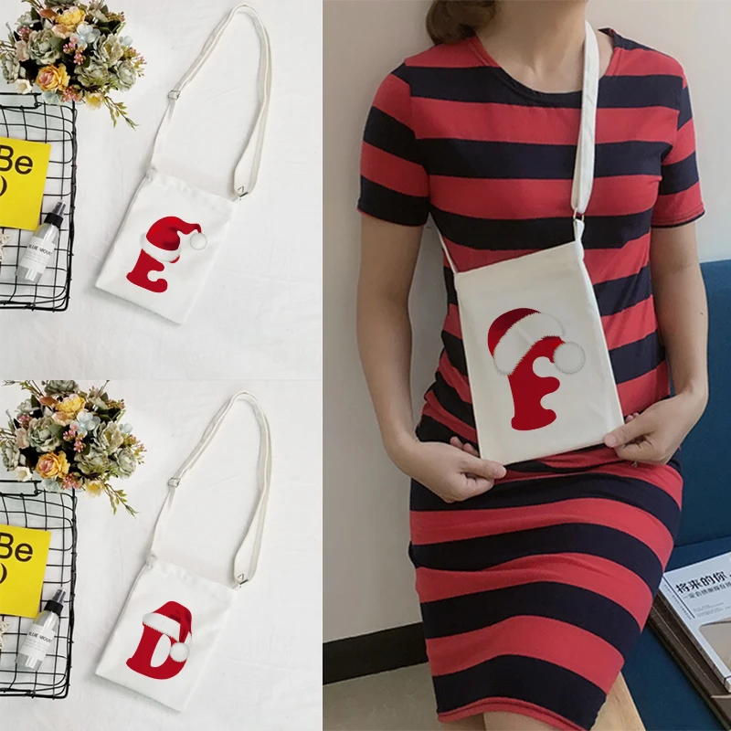 Red Christmas Hat Letters Canvas Ladies Handbag Messenger Bag Fashion Phone Key Perfume Hand Cream Ladies Shoulder Bag Storage
Red Christmas Hat Letters Canvas Ladies Handbag Messenger Bag Fashion Phone Key Perfume Hand Cream Ladies Shoulder Bag Storage