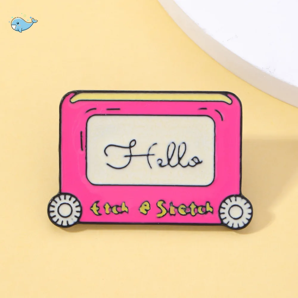 HELLO Etch A Sketch Enamel Pin Cartoon Pink Drawing Board Badge Brooch for Jewelry Accessory Gifts for Friends
HELLO Etch A Sketch Enamel Pin Cartoon Pink Drawing Board Badge Brooch for Jewelry Accessory Gifts for Friends