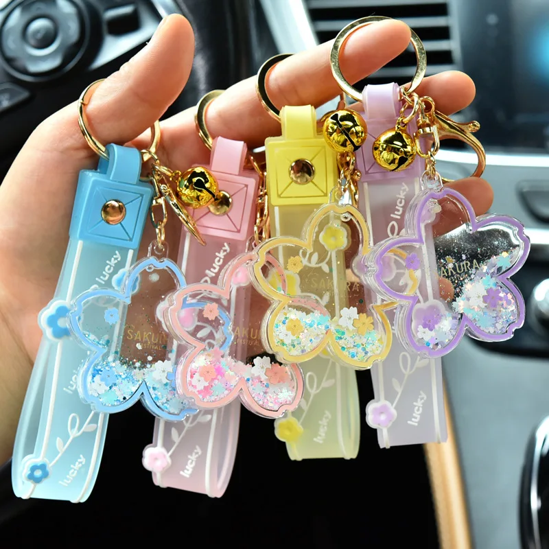 Cartoon quicksand cherry blossom keychain acrylic transparent flower into oil drift bottle bag pendant pendant small gift
Cartoon quicksand cherry blossom keychain acrylic transparent flower into oil drift bottle bag pendant pendant small gift