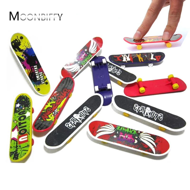 1pc Creative Printing Professional Plastic Finger Skateboard Mini Finger Boards Skate Truck Finger Skateboard For Kid Toys
1pc Creative Printing Professional Plastic Finger Skateboard Mini Finger Boards Skate Truck Finger Skateboard For Kid Toys