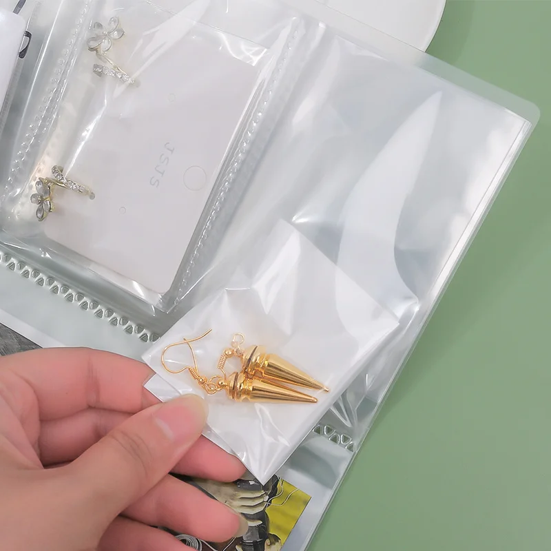 Transparent Self Sealing Adhesive Pouch PVC Bag Jewelry Storage Book Plastic Storage Bags for Jewelry Retail Display Packaging
Transparent Self Sealing Adhesive Pouch PVC Bag Jewelry Storage Book Plastic Storage Bags for Jewelry Retail Display Packaging