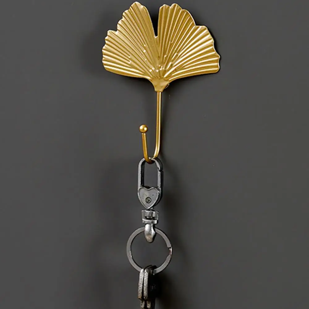 Golden Metal Leaf Shape Hook Door Wall Wardrobe Clothes Bag Hanger Storage Perforation-free decorative coat hook Hanging Decor
Golden Metal Leaf Shape Hook Door Wall Wardrobe Clothes Bag Hanger Storage Perforation-free decorative coat hook Hanging Decor