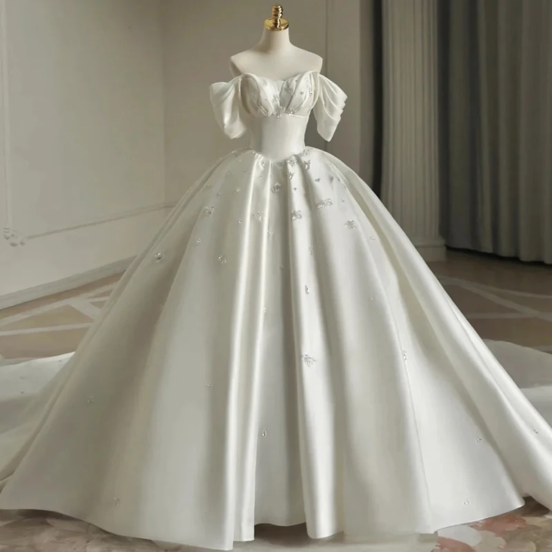 Ivory Satin Wedding Dresses For Women 2022 Exquisite Sweetheart Neck Cap Sleeve Wedding Gowns Lace Up Back Beaded Crystals
Ivory Satin Wedding Dresses For Women 2022 Exquisite Sweetheart Neck Cap Sleeve Wedding Gowns Lace Up Back Beaded Crystals