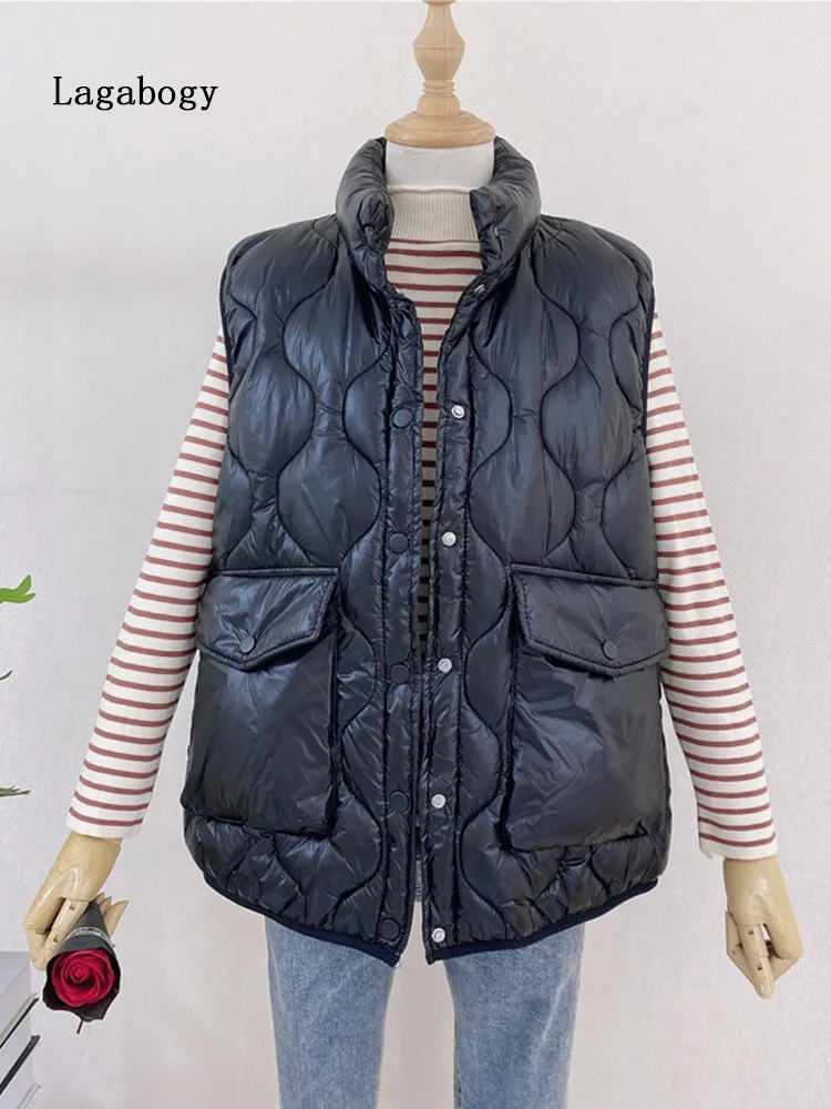 2022 New Winter Short Stand Collar Feather Vest Jacket Women 90% White Duck Down Waistcoat Casual Fluffy Sleeveless Outwear
2022 New Winter Short Stand Collar Feather Vest Jacket Women 90% White Duck Down Waistcoat Casual Fluffy Sleeveless Outwear