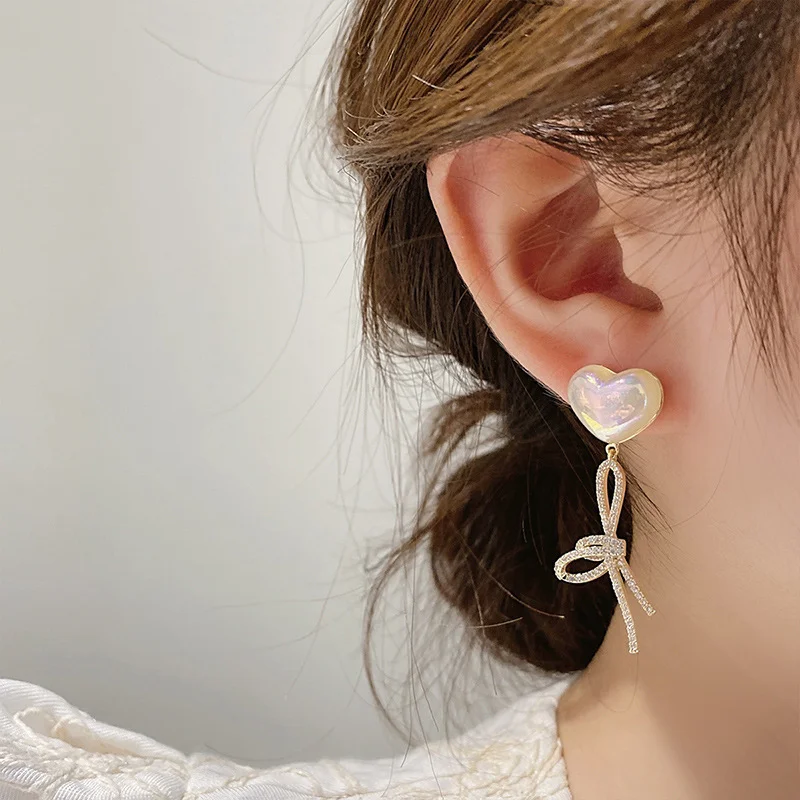ALLNEWME Trendy Rainbow AB Color Pearl Long Dangle Earrings Bling Bling Rhinestones Bowknot Earring for Women Wedding Jewelry 
ALLNEWME Trendy Rainbow AB Color Pearl Long Dangle Earrings Bling Bling Rhinestones Bowknot Earring for Women Wedding Jewelry
