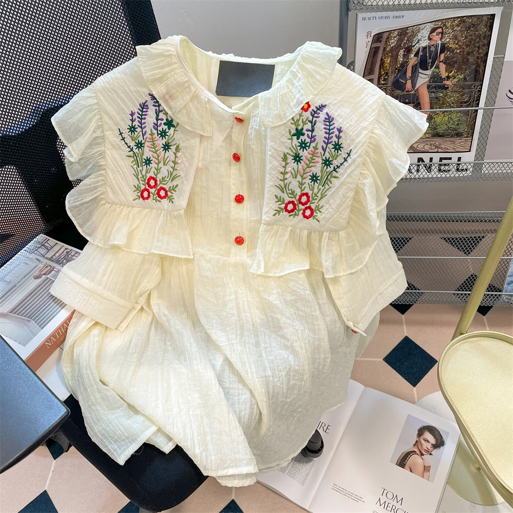 Женская винтажная рубашка с цветочной вышивкой, Элегантная блузка в Корейском стиле с воротником «Питер Пэн» и коротким рукавом с оборками, женский топ на лето 
Женская винтажная рубашка с цветочной вышивкой, Элегантная блузка в Корейском стиле с воротником «Питер Пэн» и коротким рукавом с оборками, женский топ на лето
