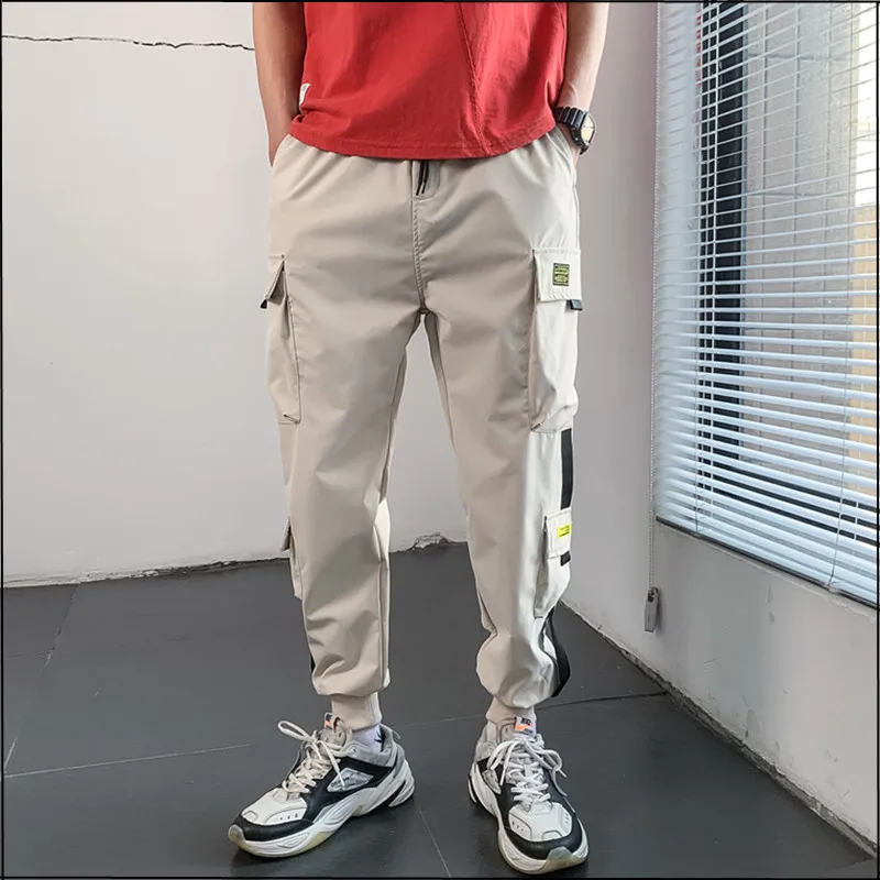 New Streetwear Men's Multi Pockets Cargo Harem Pants Hip Hop Casual Male Track Pants Joggers Trousers Fashion Harajuku Men Pants
New Streetwear Men's Multi Pockets Cargo Harem Pants Hip Hop Casual Male Track Pants Joggers Trousers Fashion Harajuku Men Pants