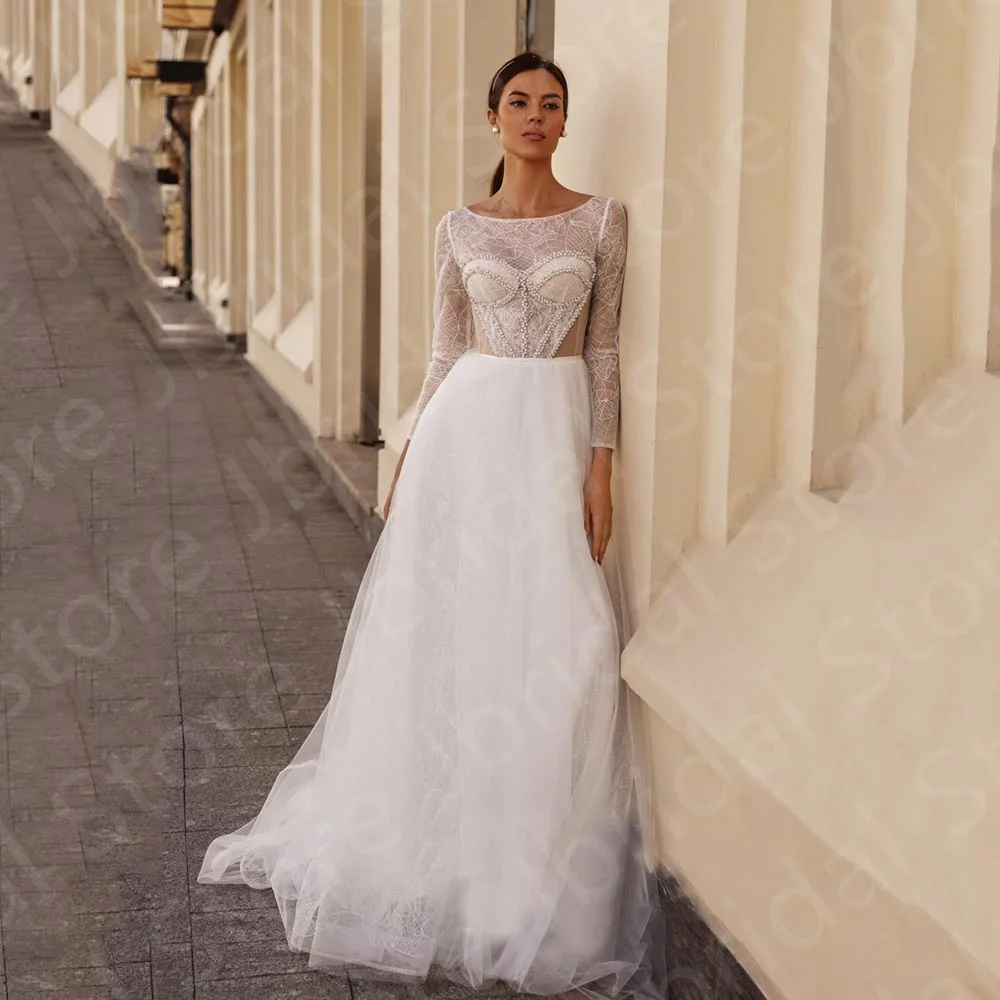 Новинка 2023, классические кружевные свадебные платья, платья невесты с длинным рукавом, вырезом лодочкой, жемчужинами и бусинами, женское платье с вырезом на спине
Новинка 2023, классические кружевные свадебные платья, платья невесты с длинным рукавом, вырезом лодочкой, жемчужинами и бусинами, женское платье с вырезом на спине