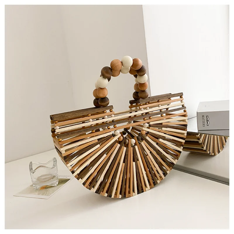 Полукруглая бамбуковая плетеная Сумочка с жемчужной ручкой, дизайнерская пляжная сумка для женщин, летняя Роскошная сумочка женская, модель 2022 
Полукруглая бамбуковая плетеная Сумочка с жемчужной ручкой, дизайнерская пляжная сумка для женщин, летняя Роскошная сумочка женская, модель 2022