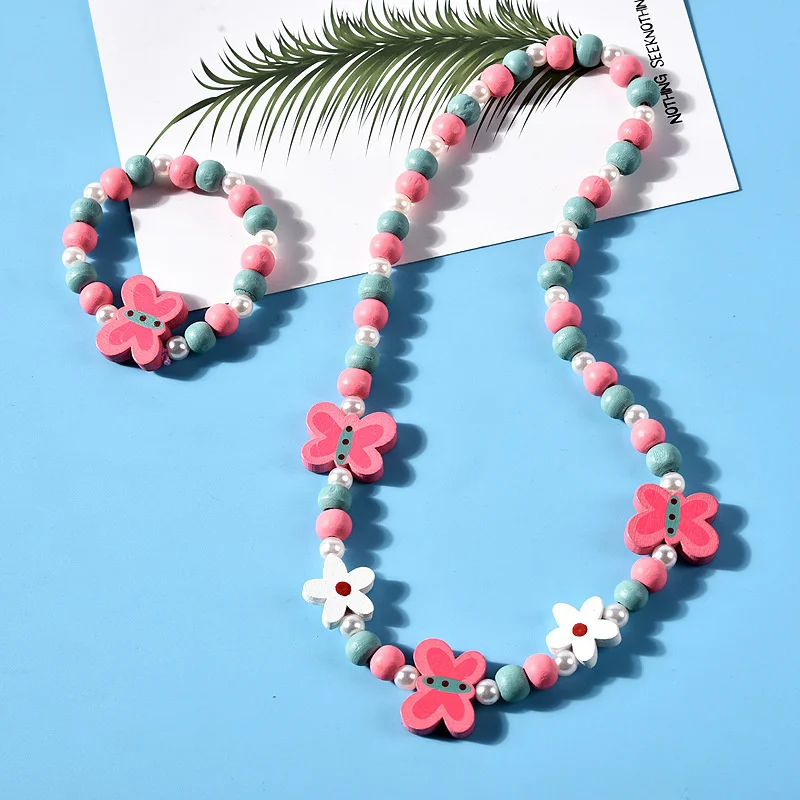 2pcsset Natural Wood Beads Jewelry Set for Kids Cute Animal Pattern Necklace Bracelet Party Jewelry Girls Birthday Gifts
2pcsset Natural Wood Beads Jewelry Set for Kids Cute Animal Pattern Necklace Bracelet Party Jewelry Girls Birthday Gifts