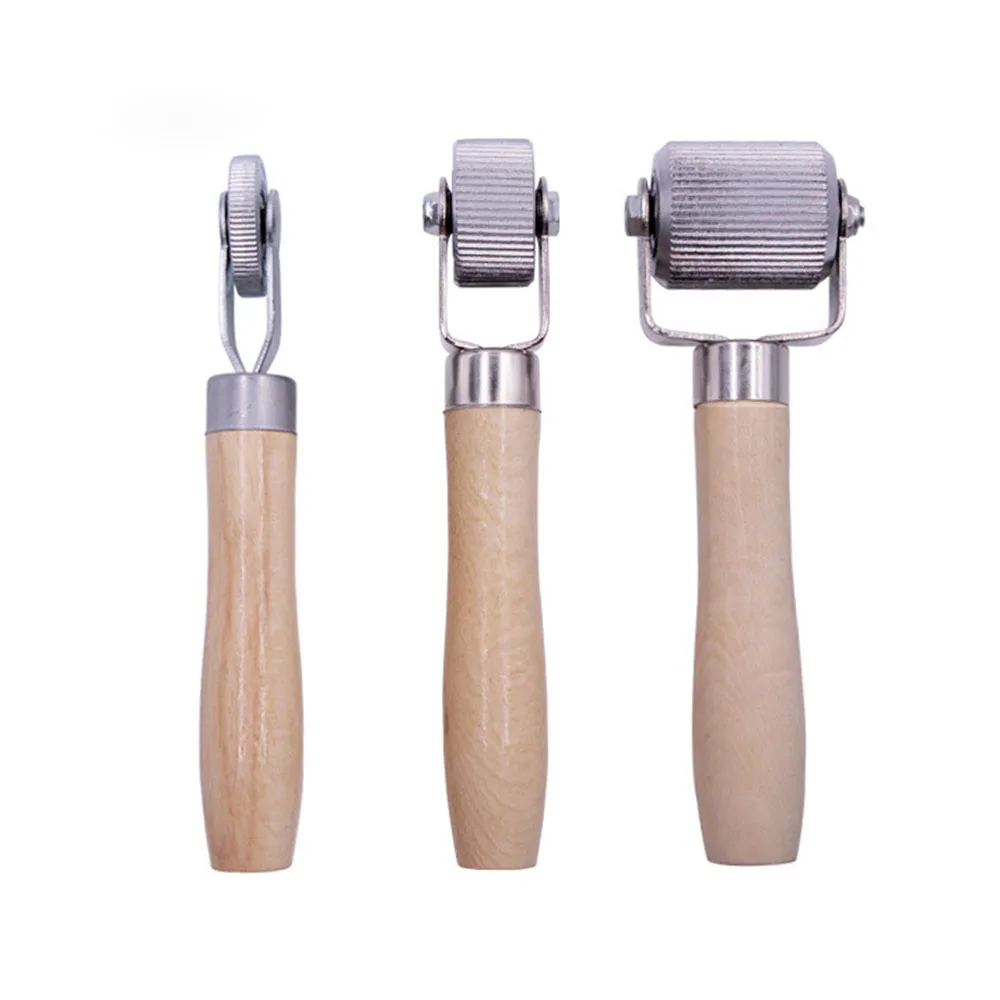 Roll-on roller with wooden handle, patch rolling roller, roll-on roller, tire changer roller, roll-on roller
Roll-on roller with wooden handle, patch rolling roller, roll-on roller, tire changer roller, roll-on roller