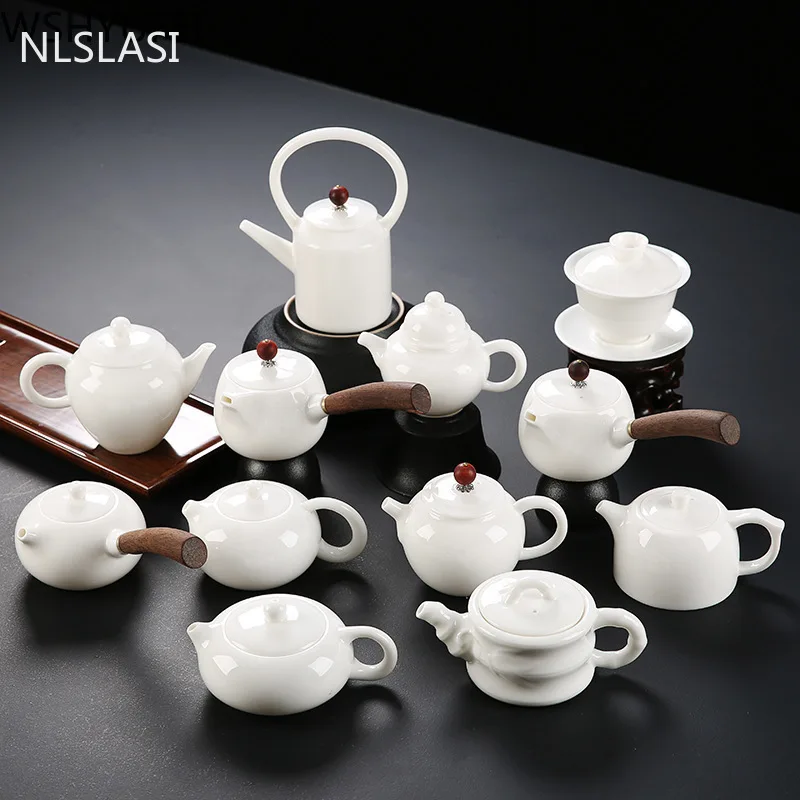 

Заварочный чайник NLSLASI ручной работы, белый фарфоровый чайный набор с деревянной ручкой, цвет слоновой кости, китайский чайный набор, инстру...
