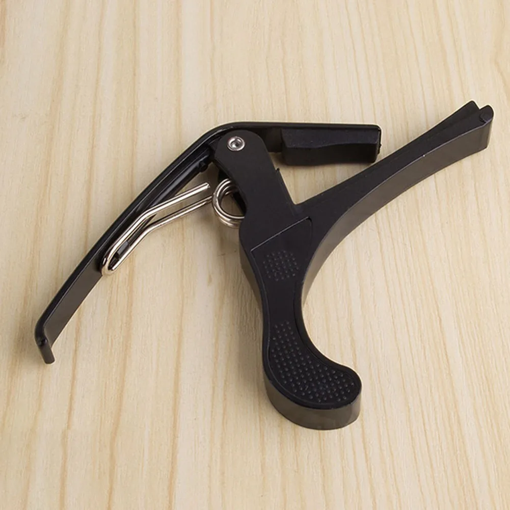 Quick Capo Single-Handed 6-String Change Classic Clip Electric Guitar Protable Reliable Useful Duable Hot Sale Newest
Quick Capo Single-Handed 6-String Change Classic Clip Electric Guitar Protable Reliable Useful Duable Hot Sale Newest