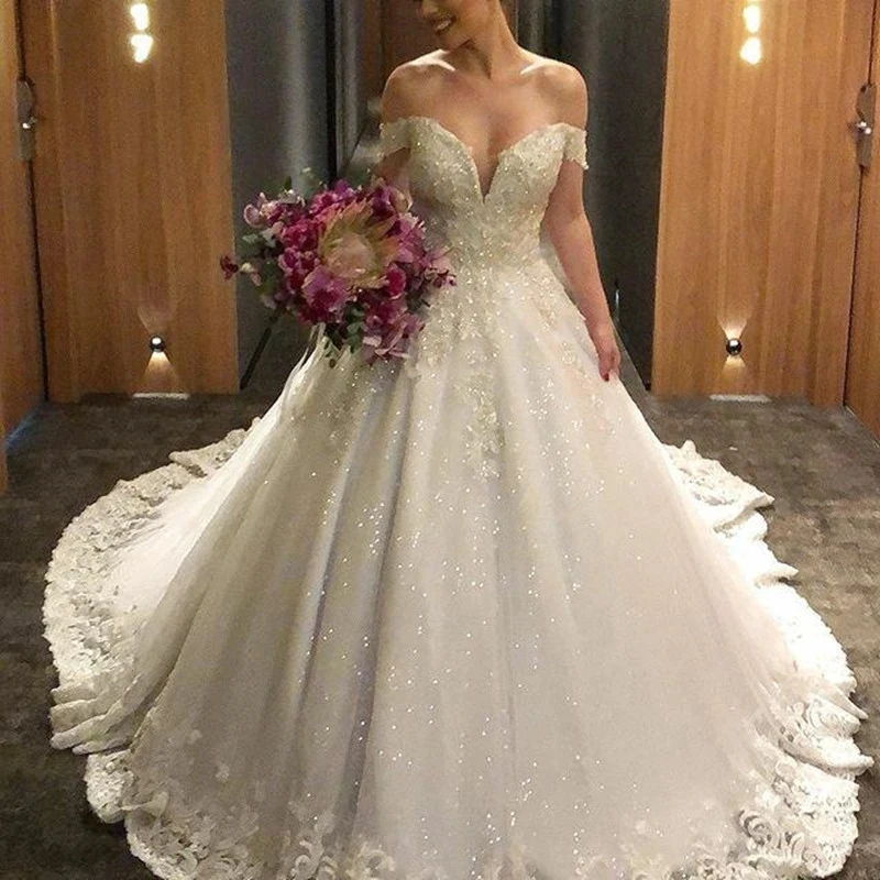 

2023 Ball Gown Wedding Dress Sweetheart Off Shoulder Lace Appliques Backless Shining Tulle Princess Bridal Gown Vestido De Noiva