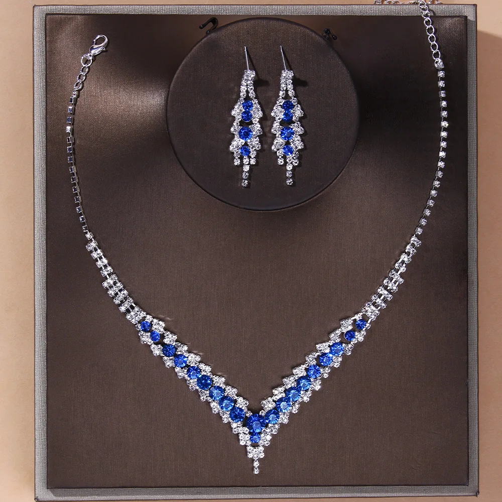 TREAZY Elegant Blue Rhinestone Crystal Wedding Bridal Jewelry Set for Women Silver Plated V Shape Choker Necklace Earrings Set
TREAZY Elegant Blue Rhinestone Crystal Wedding Bridal Jewelry Set for Women Silver Plated V Shape Choker Necklace Earrings Set