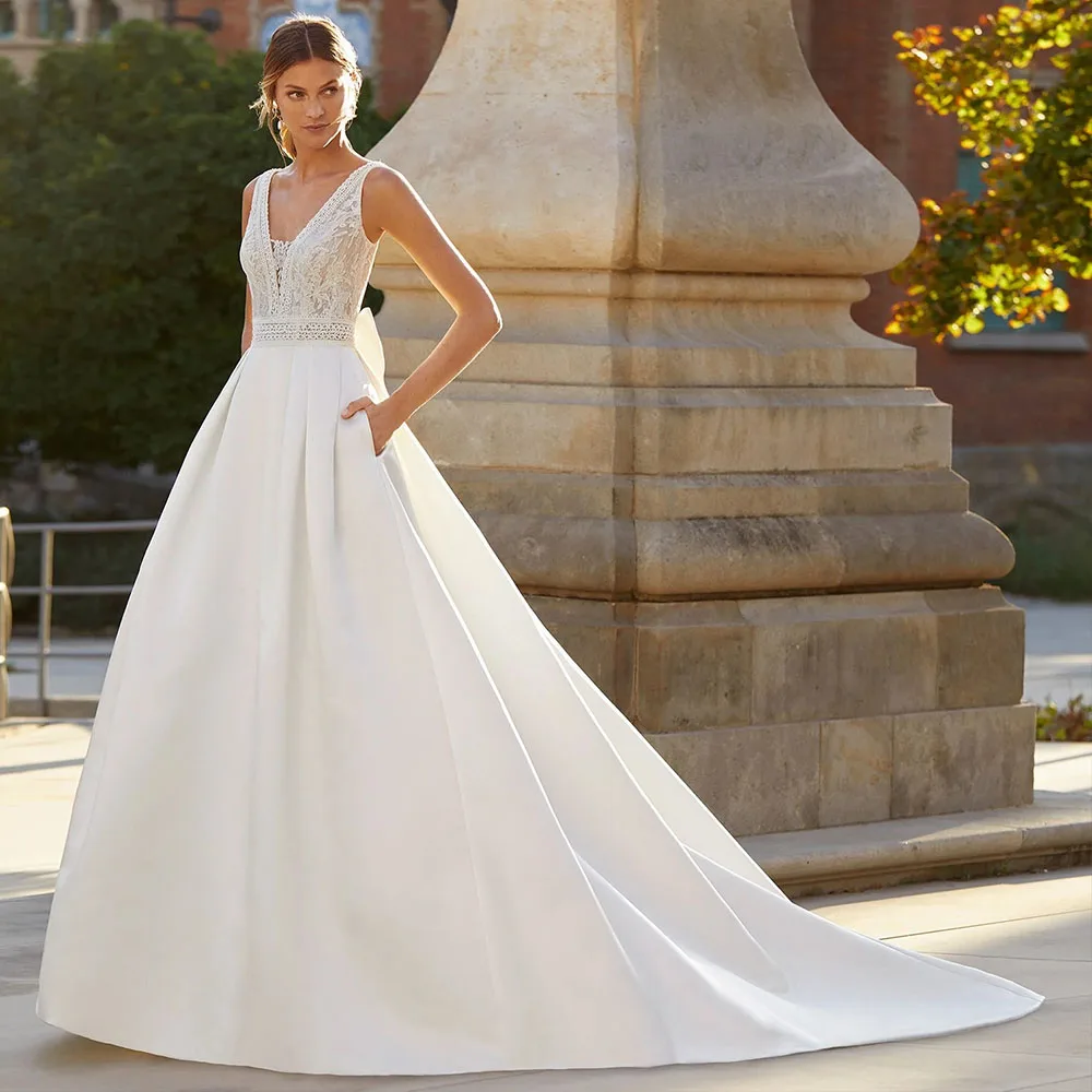 Elegant Wedding Dresses A-Line Sweep Train V Neck Spaghetti Strap Bride Dress Satin With Pocket Bow Back Vestido De Noiva 2023
Elegant Wedding Dresses A-Line Sweep Train V Neck Spaghetti Strap Bride Dress Satin With Pocket Bow Back Vestido De Noiva 2023