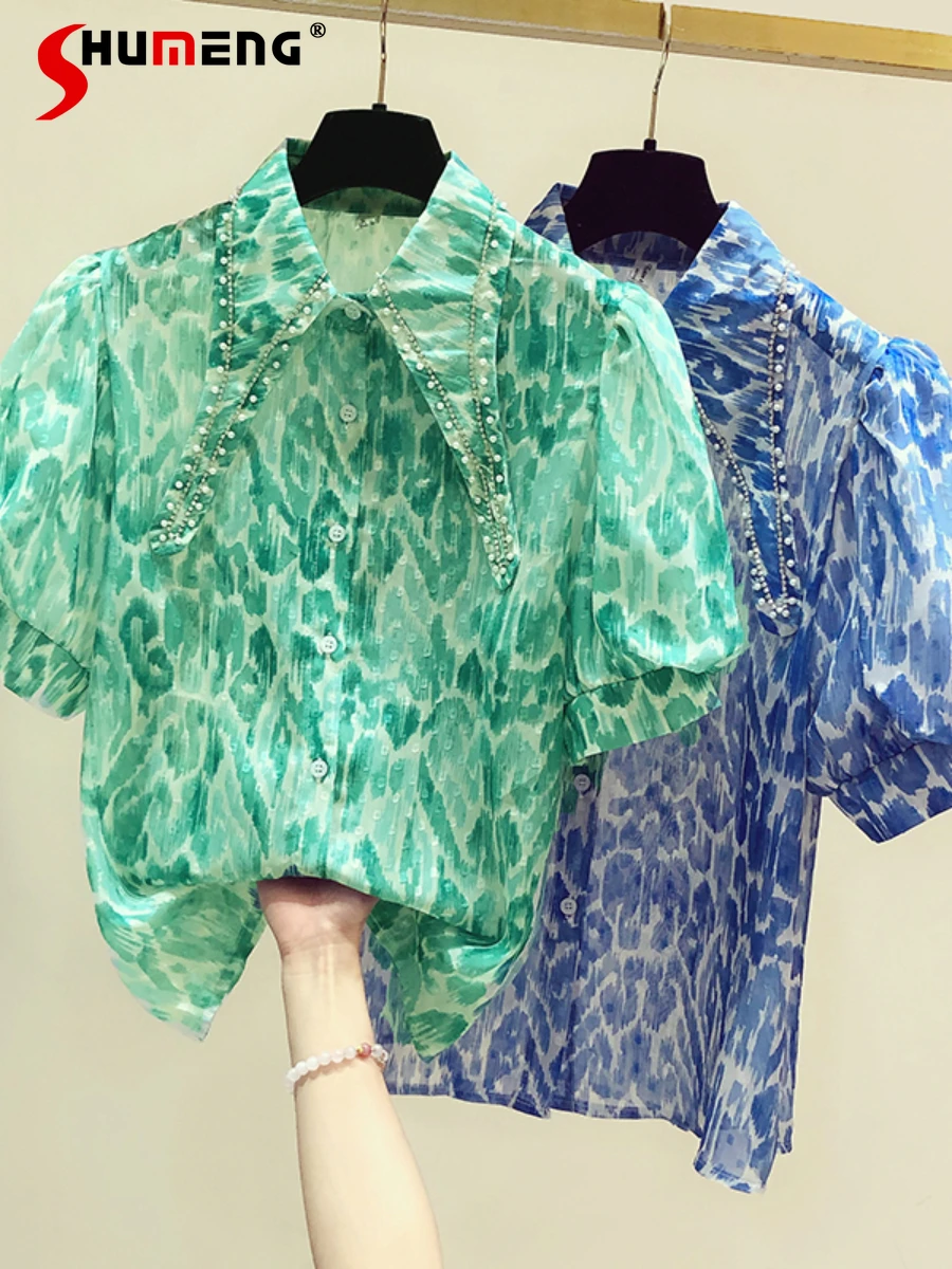 Camisas Mujer Vintage Court Style Diamond Beaded Pointed Collar Short Puff Sleeve Shirt Women's Summer Loose Floral Top
Camisas Mujer Vintage Court Style Diamond Beaded Pointed Collar Short Puff Sleeve Shirt Women's Summer Loose Floral Top