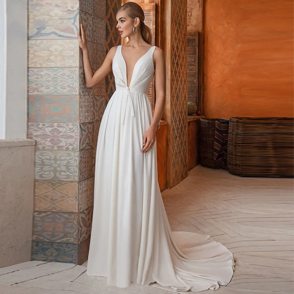 Simple Stain Wedding Dresses Deep V Neck Sleeveless Backless Bow Sashes Bridal Gown With Long Court Train Vestido De Novia
Simple Stain Wedding Dresses Deep V Neck Sleeveless Backless Bow Sashes Bridal Gown With Long Court Train Vestido De Novia