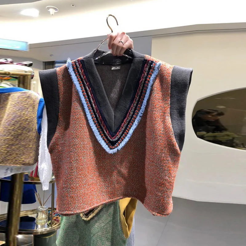Spring Autumn V-neck Sleeveless Waistcoat Female New Polyester Short Knitted Vest S-XL 2 Color Women Slim Short Sweater Vests
Spring Autumn V-neck Sleeveless Waistcoat Female New Polyester Short Knitted Vest S-XL 2 Color Women Slim Short Sweater Vests