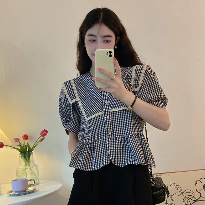 Vintage Bubble Sleeve Plaid Shirt women's summer 2022 new design sense, niche Korean chic short top
Vintage Bubble Sleeve Plaid Shirt women's summer 2022 new design sense, niche Korean chic short top