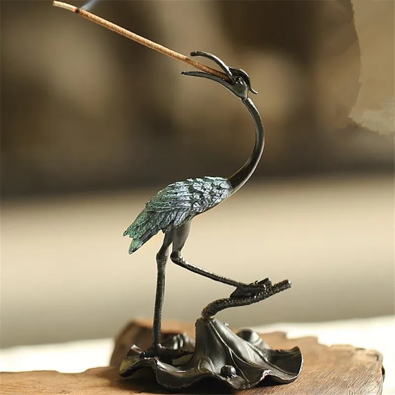 Archaize creative crane incense stick bronze Buddhist incense stick table household decoration incense burner statue
Archaize creative crane incense stick bronze Buddhist incense stick table household decoration incense burner statue