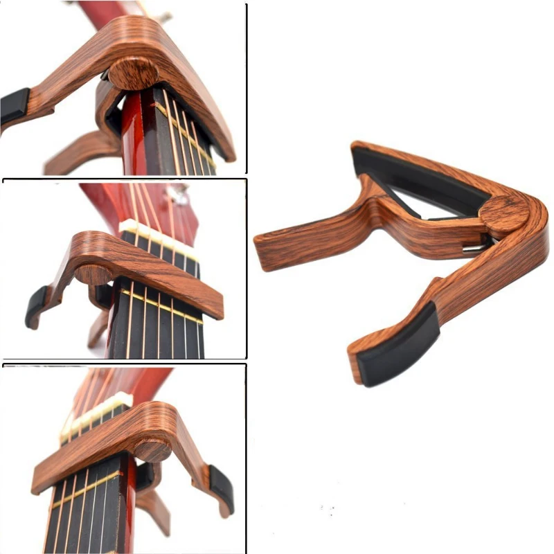 Wood Grain Guitar Capo Clip With Perfect Silicon Cushion For Acoustic Electric Guitar Bass Ukulele Instrument Tuning Accessories
Wood Grain Guitar Capo Clip With Perfect Silicon Cushion For Acoustic Electric Guitar Bass Ukulele Instrument Tuning Accessories