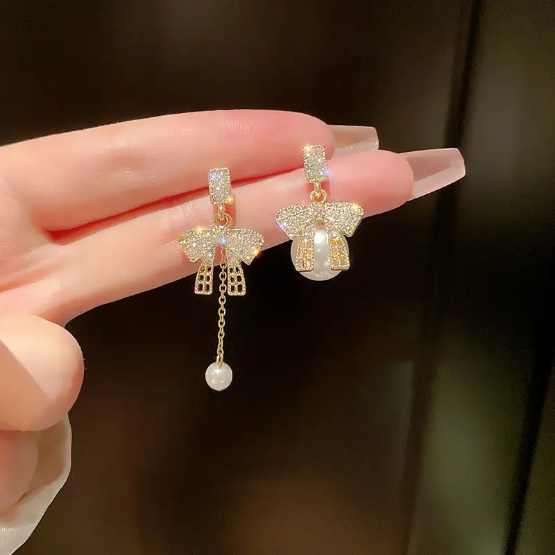 925 silver needle Korea Dongdaemun pearl fringed tassel bow long earrings ins fashion earrings earrings for women
925 silver needle Korea Dongdaemun pearl fringed tassel bow long earrings ins fashion earrings earrings for women