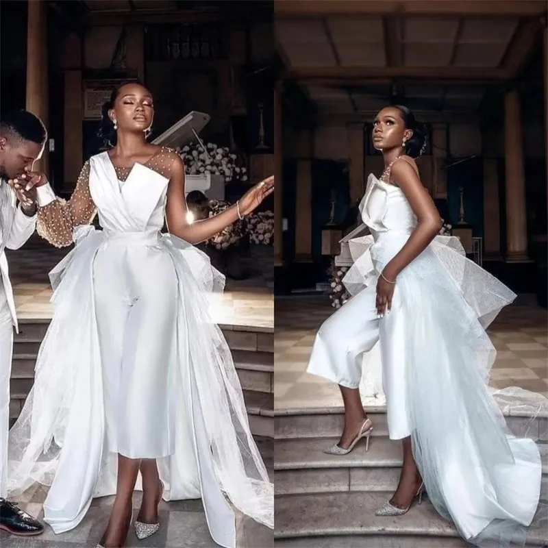 Elegant Beach Jumpsuit Pearls Wedding Dresses Bridal Gowns With Detachable Train Sheer Long Sleeve Robe De Mariée Custom Made
Elegant Beach Jumpsuit Pearls Wedding Dresses Bridal Gowns With Detachable Train Sheer Long Sleeve Robe De Mariée Custom Made