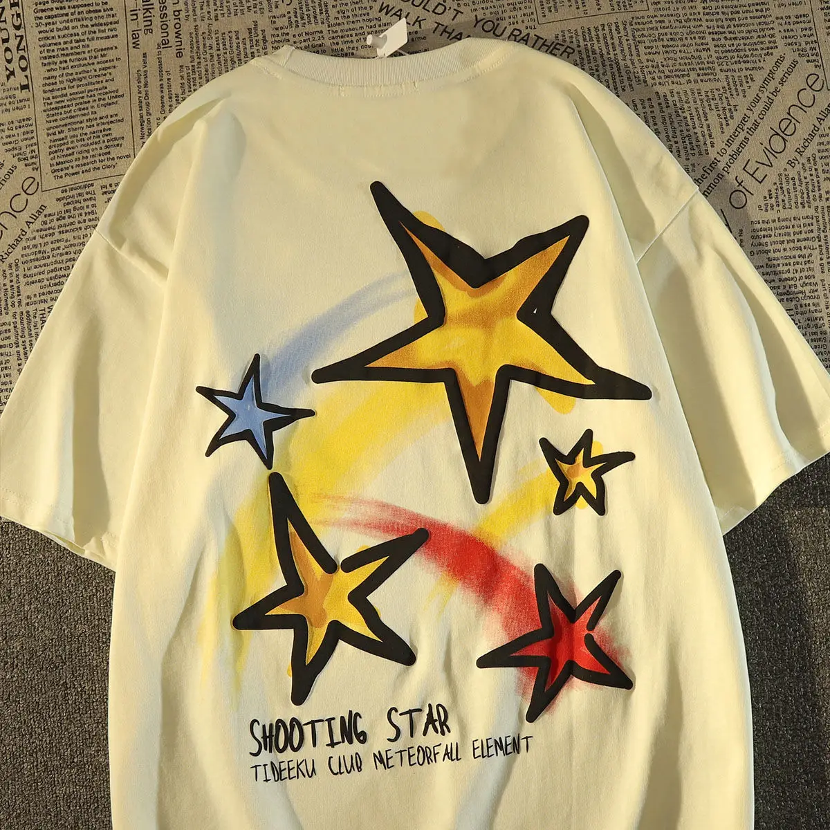 American retro star shaped graphic T-shirt printed short sleeved men and women loose fitting casual trend couple top harajuku
American retro star shaped graphic T-shirt printed short sleeved men and women loose fitting casual trend couple top harajuku