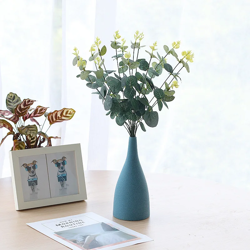 Fake Eucalyptus Leaf 5 Branch Artifical flower arts Green plant home decoration Nature Spring office garden Decor for Easter
Fake Eucalyptus Leaf 5 Branch Artifical flower arts Green plant home decoration Nature Spring office garden Decor for Easter