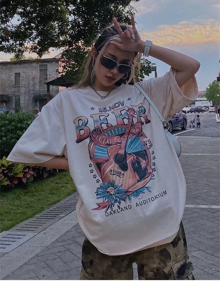 Retro Guitar Graphic T-Shirt 90s Style Crew Neck Pullover Women Retro Top Street Oversized Loose Clothes Harajuku O-Neck Shirt
Retro Guitar Graphic T-Shirt 90s Style Crew Neck Pullover Women Retro Top Street Oversized Loose Clothes Harajuku O-Neck Shirt